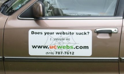 Car sticker "Does your website suck? (people in)". Visit www.u-cwebs.com.